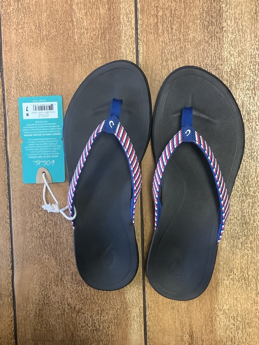 OluKai Women's Navy Sandals with Red-White-Blue Striped Straps